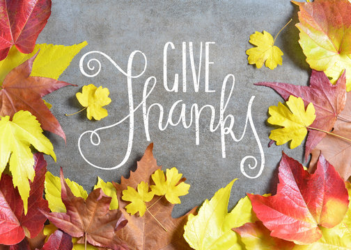GIVE THANKS hand lettered card with autumn leaves