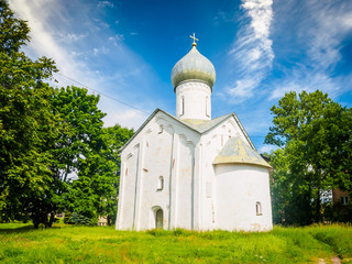 Fototapeta na wymiar XV Century White Walls Orthodox Church In Novgorod, Russia
