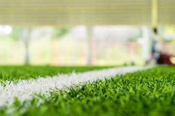 White line on the edge of an indoor soccer sport field