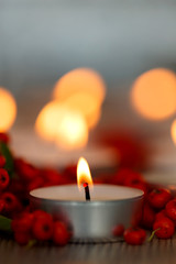 Christmas candles with berries