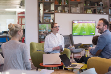 Startup Business Team At A Meeting at modern office building