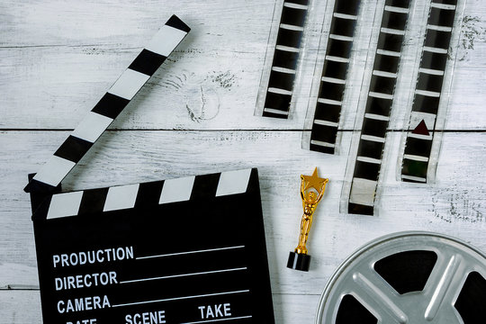 Clapperboard and coil with film