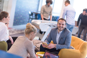 Startup Business Team At A Meeting at modern office building