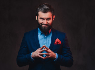 A man dressed in an elegant suit.