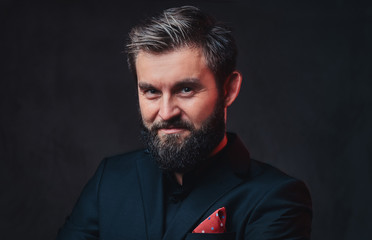 A man dressed in an elegant suit.