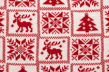 Knitted fabric with scandinavian christmas ornament