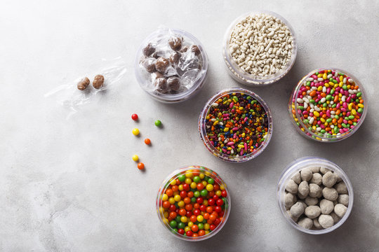 Mouth Fresheners And Digestive Candies in Bowls. Light background.
