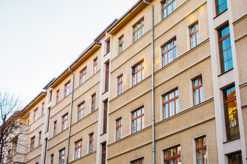 Obraz premium orange apartment building with high saturation