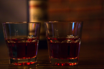 red wine two glasses and a bottle