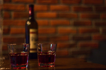 red wine two glasses and a bottle