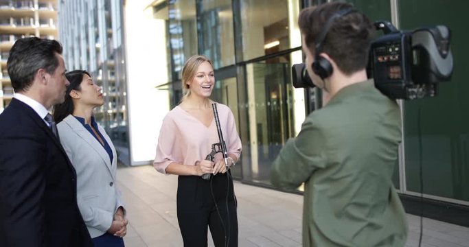 Media group interview being recorded for broadcast