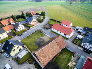 Building development with detached houses on the edge of a village near Wolfsburg, Germany, aerial...