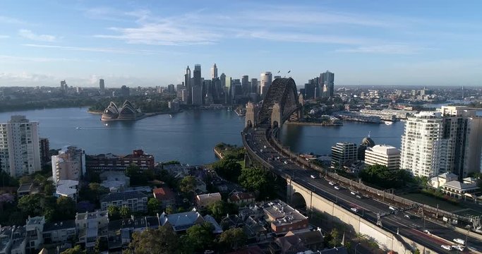 Cahill expressway and Sydney Harbour bridge towards city CBD across Harbour aerial panning from Kirribilli.
