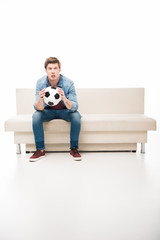 young man with soccer ball