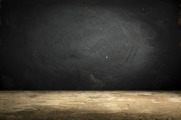 Old wood table top with smoke in the dark background.