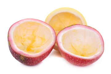 Passion fruit cut in half isolated on white background