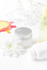 natural organic cosmetics with herbs for baby on white backgroun