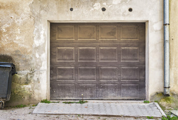 Garage woode door, dirty grunge wall background