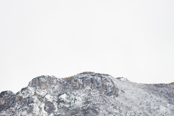 Aerial view on the top of mountain covered in snow, Trentino, Italy, Europe
