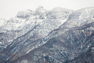 Aerial view on the mountains covered in snow, Trentino, Italy, Europe