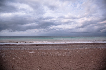 a long gray sky over the beach
