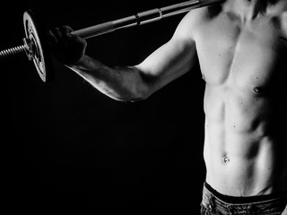 the young well-trained man has muscles
