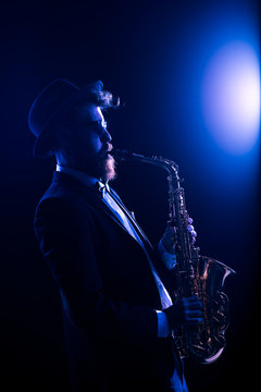 Jazz musician performing with a saxophone