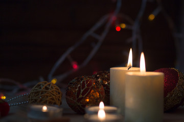 Decoration for Christmas and New Year. Xmas day. Candles and shining decorations. 