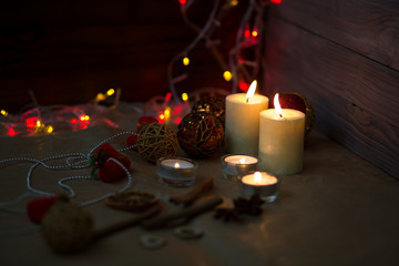 Decoration for Christmas and New Year. Xmas day. Candles and shining decorations. 
