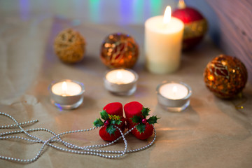 Decoration for Christmas and New Year. Xmas day. Candles and shining decorations. 