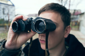 Hunter with binoculars