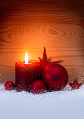Christmas red decoration and Advent candle. Christmas card.