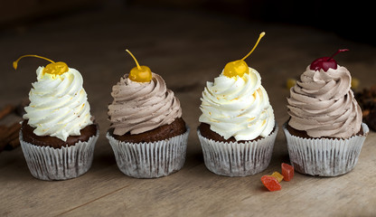 Chocolate Cupcakes with Cherry and Cream
