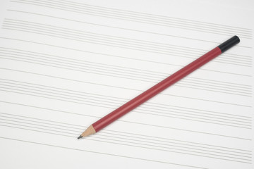 Music empty sheet with pencil