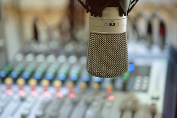 microphone in broadcast room with blur background