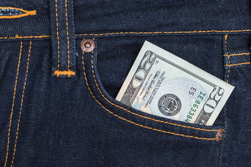 dollars in jeans pocket closeup