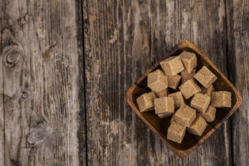 Bowl with cubes of cane sugar