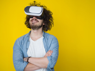 handsome man using VR headset glasses of virtual reality