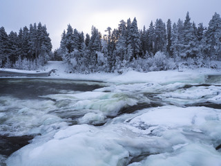 Magic Winter waterfall Storforsen in the North oSweden