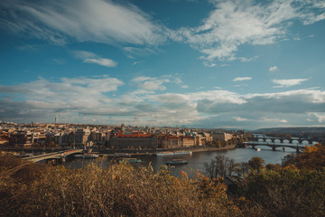 Obraz premium Prague, Czech Republic - view on Dvorak embankment, Vltava river, President Hotel Prague building and old town of Prague. Panorama of Prague city center, Czech Republic.