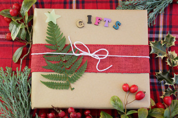 Naturally wrapped gift with a seasonal background