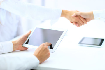 The transaction was completed. businessmen shake hands.