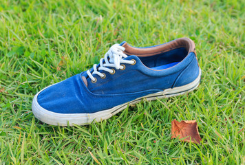 shoes on green grass