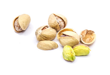Group of pistachio nuts isolated on white background.