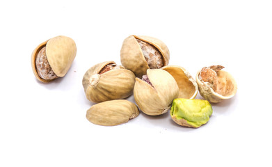 Group of pistachio nuts isolated on white background.