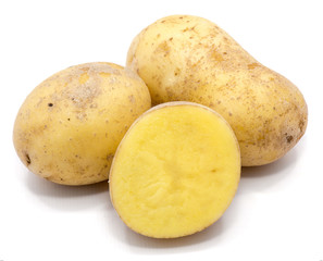 Two whole potatoes and a half isolated on white background.