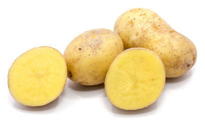Two whole potatoes and two halves isolated on white background.