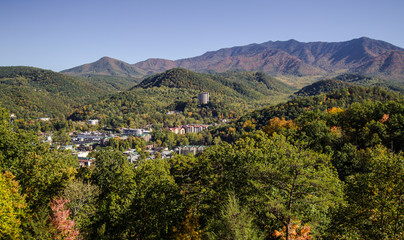 Fototapeta na wymiar Overlook View Of Gatlinburg. View of the popular resort town of Gatlinburg Tennessee surrounded by the Great Smoky Mountains National Park. 