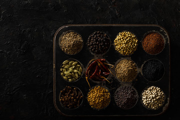 Indian Spices / Masala Box on a Black Background. 