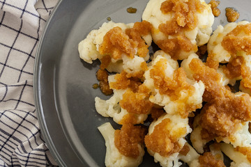Vegetarian cooked cauliflower with bread crumb